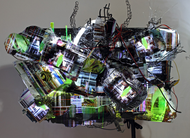 “Screenscaping #2” 2013 ,7 Channel Video Sculpture, (1) 19″ LED screen, (1) 7″ LCD screen (5) 3.5″ LCD screens , fiber optics, printed plastic, glass, metal, Auto-start HD Media Player, 1 of 1 video/audio track. [dNASAb]